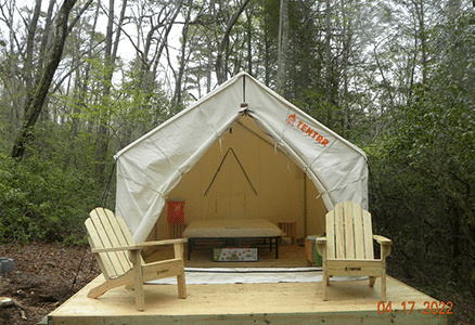 tentrr camping tent with two chairs outside